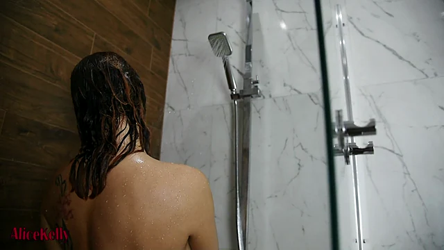 EXTREMELY BEAUTIFUL BABE IS GETTING HOT IN SHOWER AND RIDING BLACK DILDO AliceKellyXXX